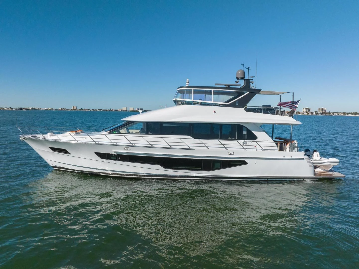 a boat on the water aboard MY 3 GALS Yacht for Sale