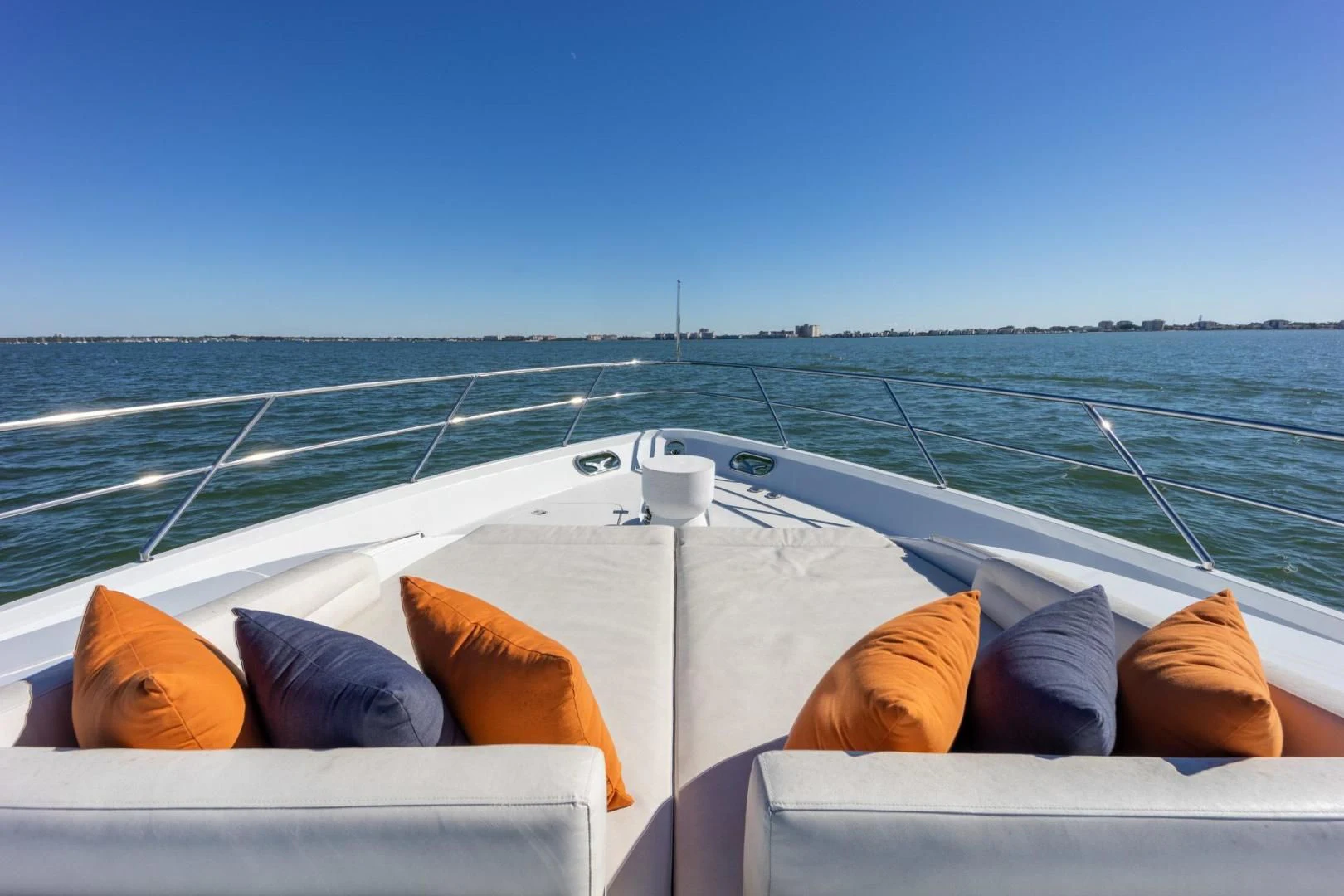 a boat with orange pillows on the water aboard MY 3 GALS Yacht for Sale