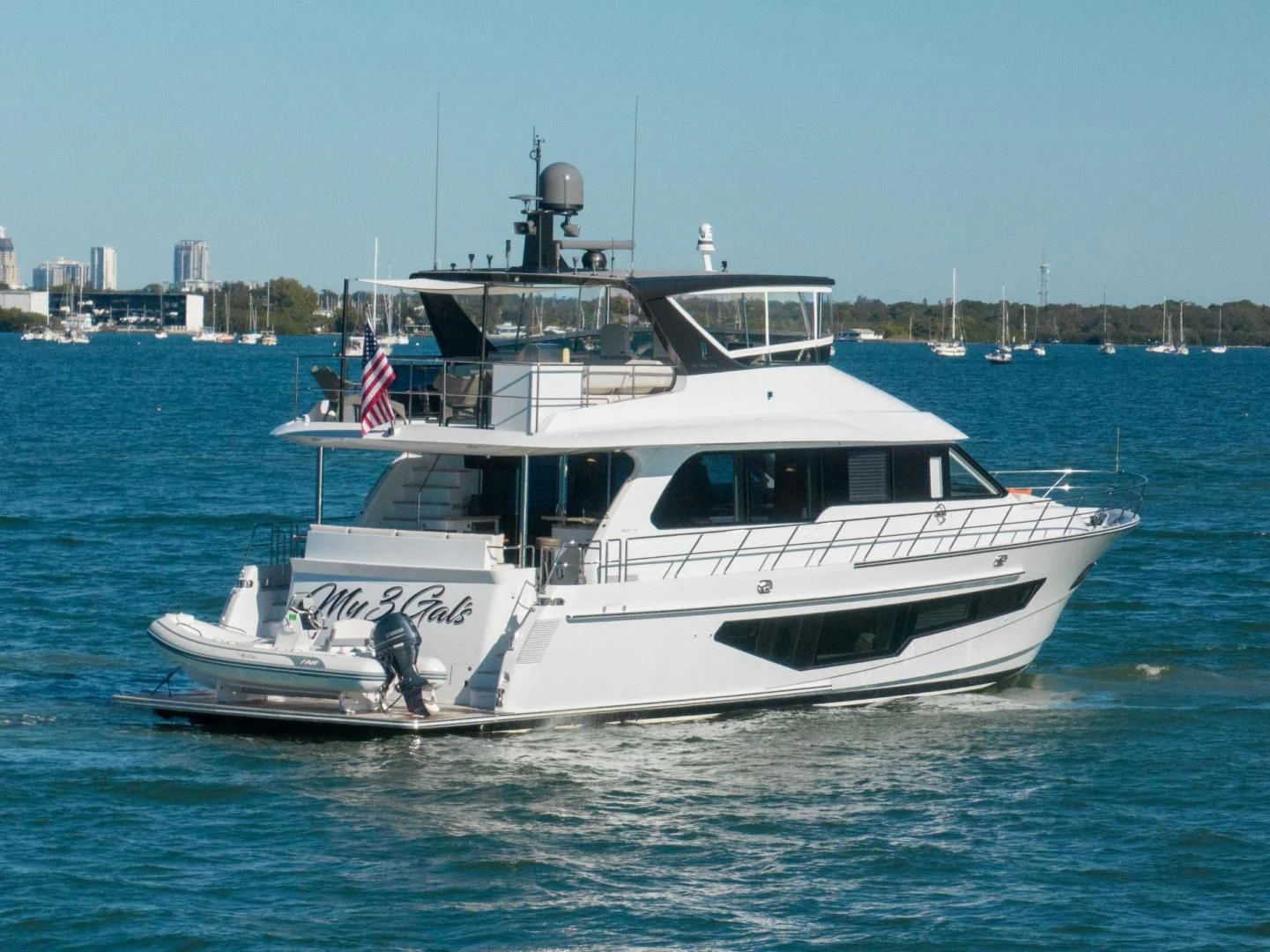 a boat on the water aboard MY 3 GALS Yacht for Sale