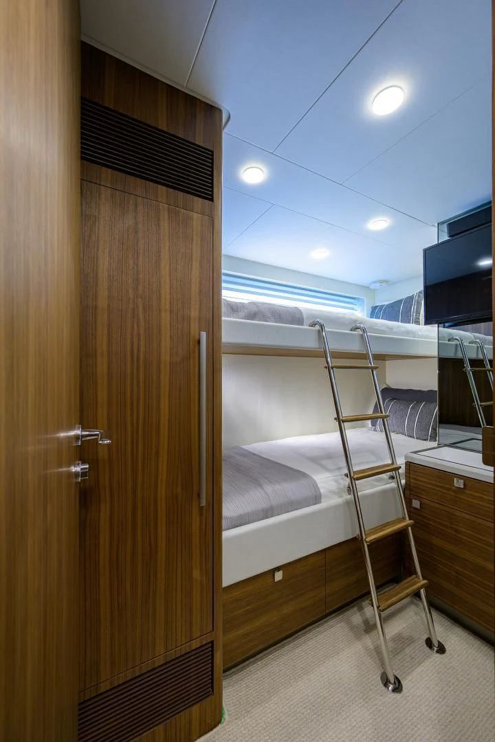 a bunk bed in a room aboard MY 3 GALS Yacht for Sale