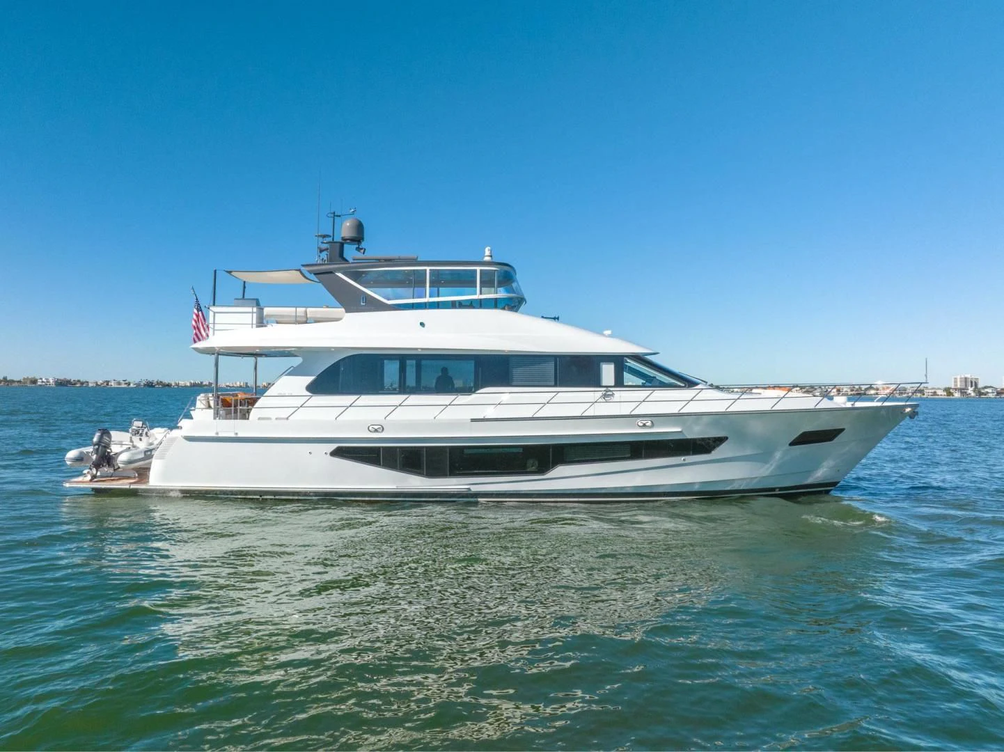 a boat on the water aboard MY 3 GALS Yacht for Sale