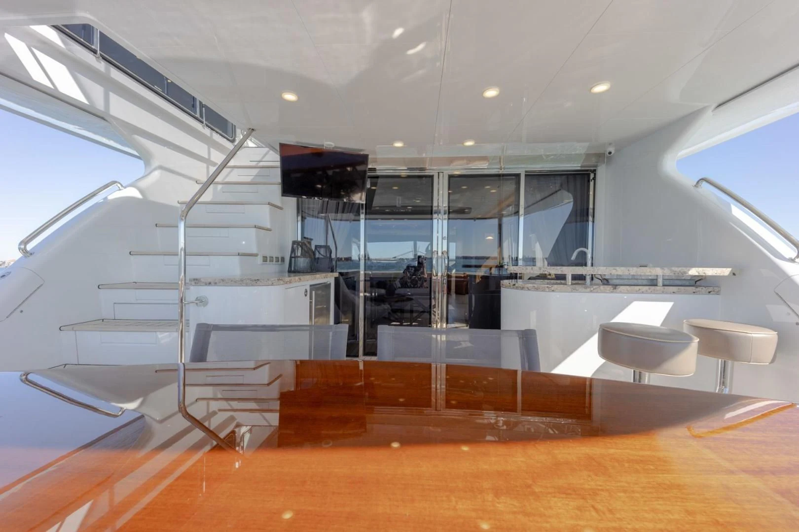 a large glass wall with glass windows aboard MY 3 GALS Yacht for Sale
