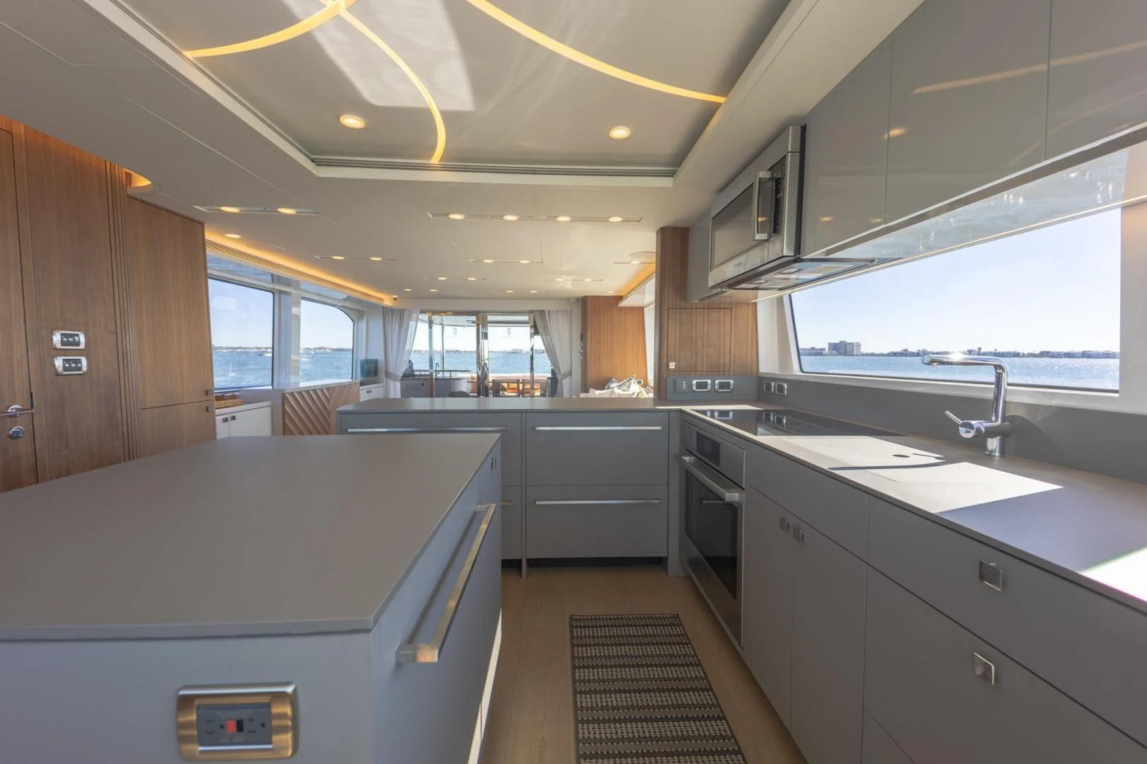 a kitchen with a large island aboard MY 3 GALS Yacht for Sale