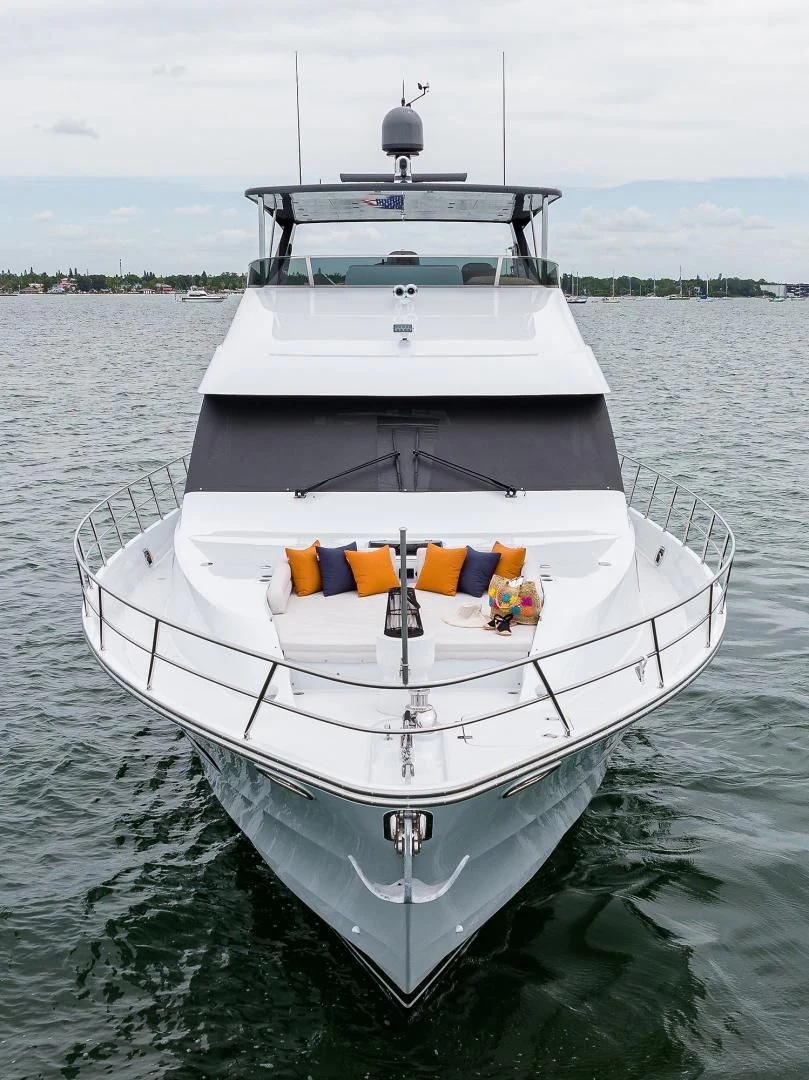 a white boat in the water aboard MY 3 GALS Yacht for Sale