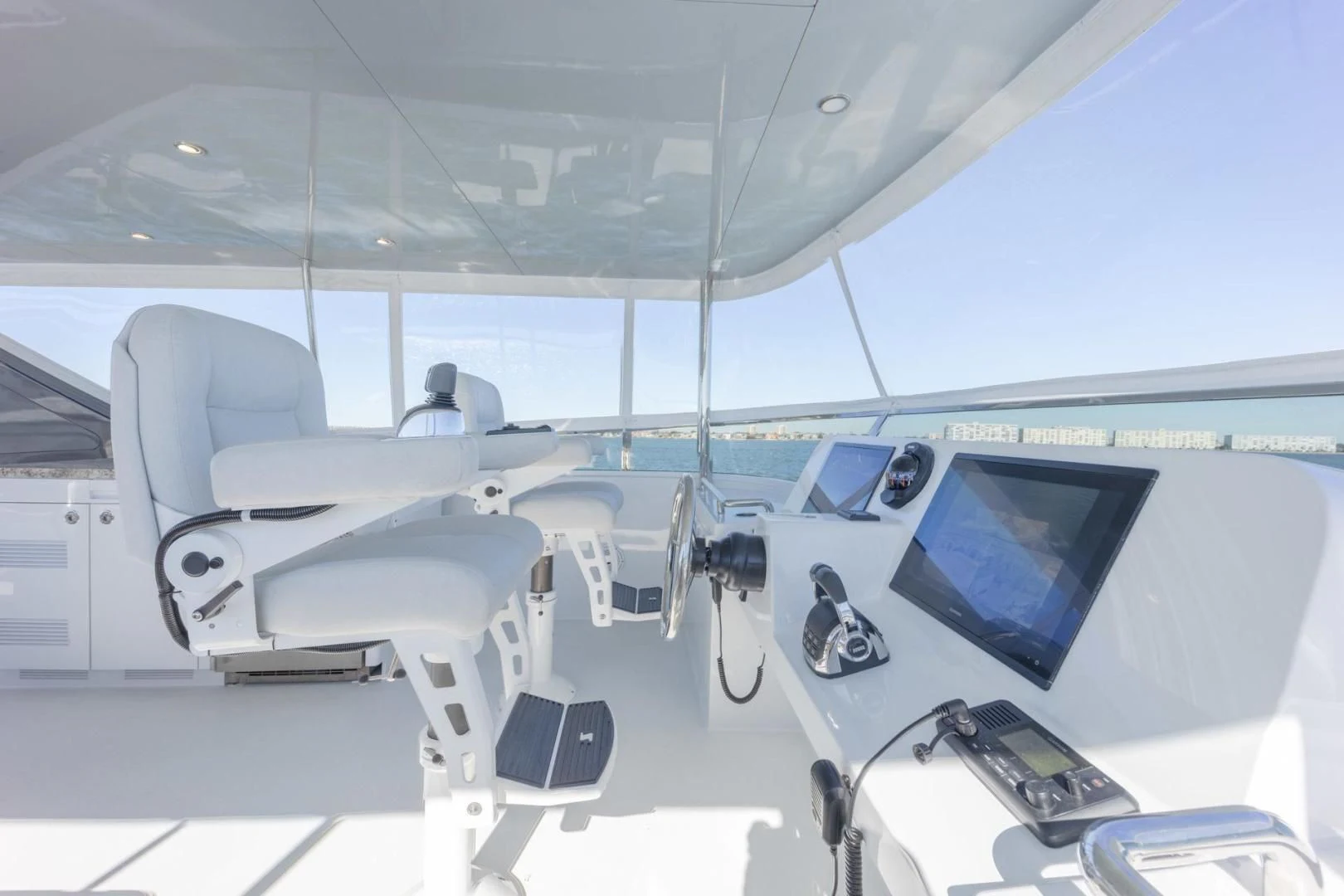 a room with a large window and a few computers aboard MY 3 GALS Yacht for Sale