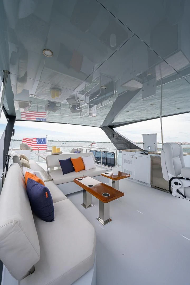 a room with a bed and a desk aboard MY 3 GALS Yacht for Sale