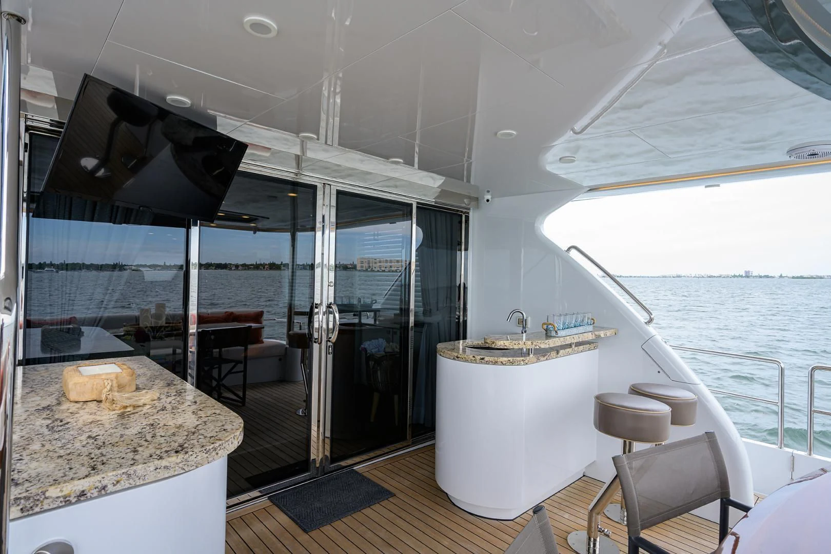 a large kitchen with a large glass shower aboard MY 3 GALS Yacht for Sale