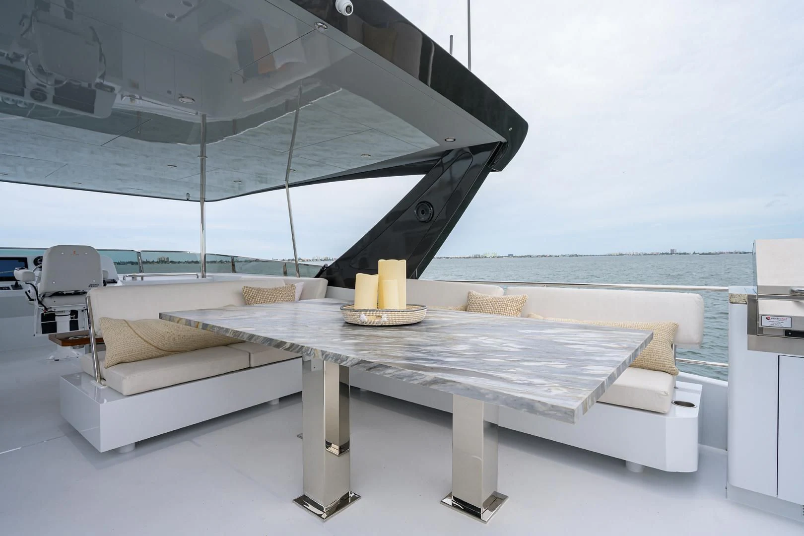 a table with a glass top aboard MY 3 GALS Yacht for Sale