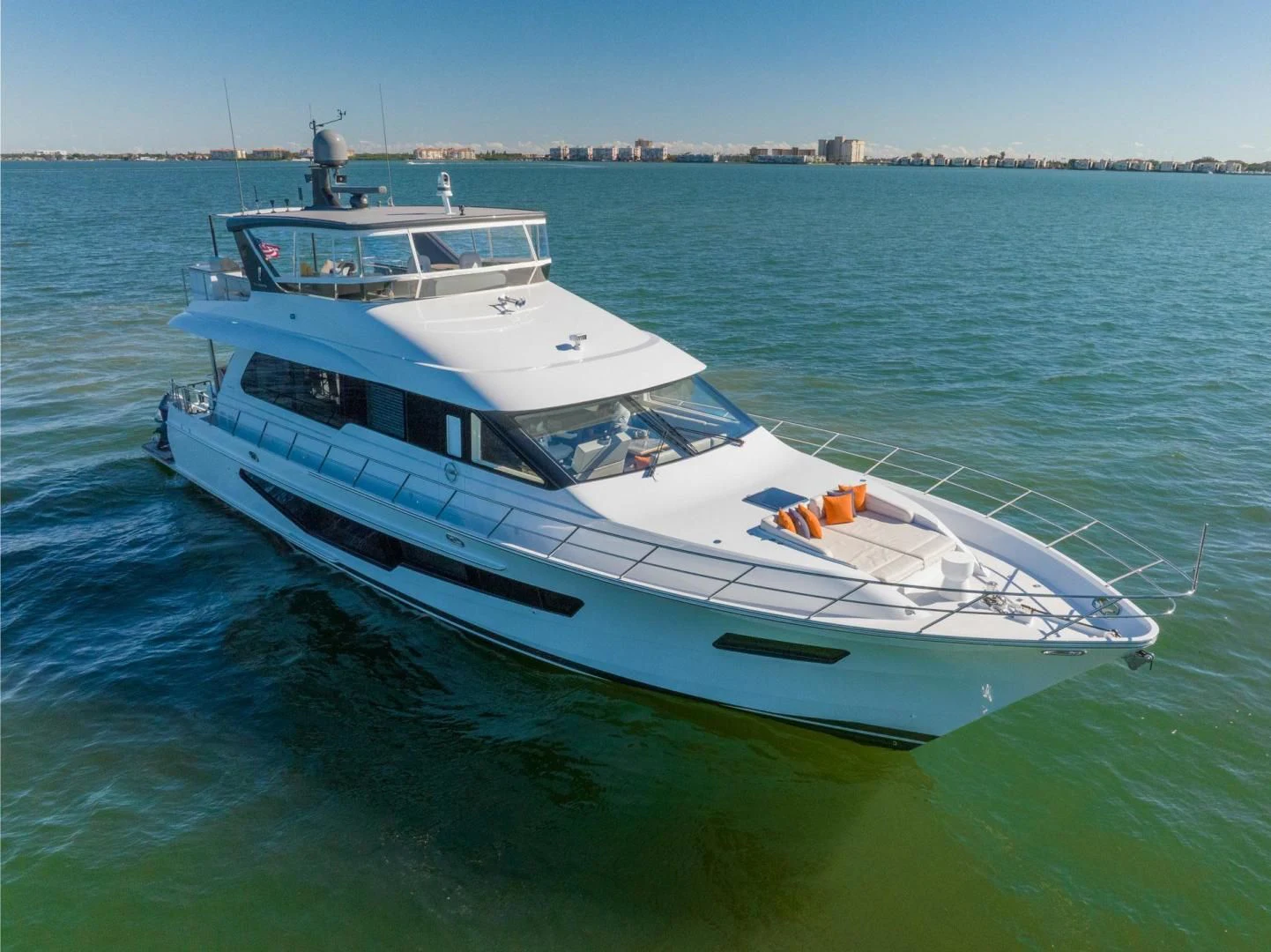 a white boat in the water aboard MY 3 GALS Yacht for Sale