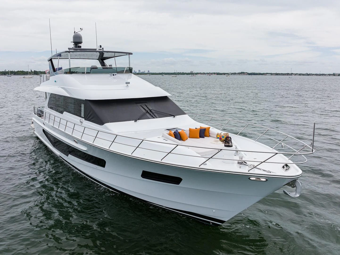 a white boat on the water aboard MY 3 GALS Yacht for Sale