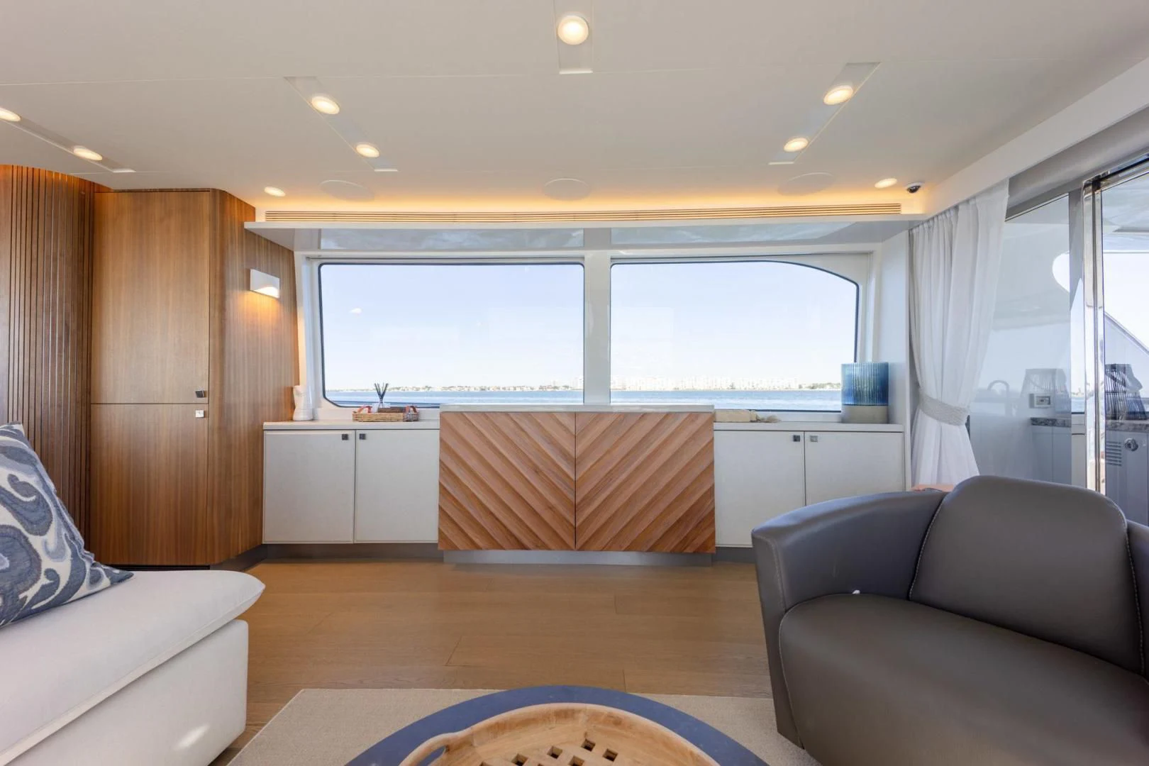 a living room with a couch and a tv aboard MY 3 GALS Yacht for Sale