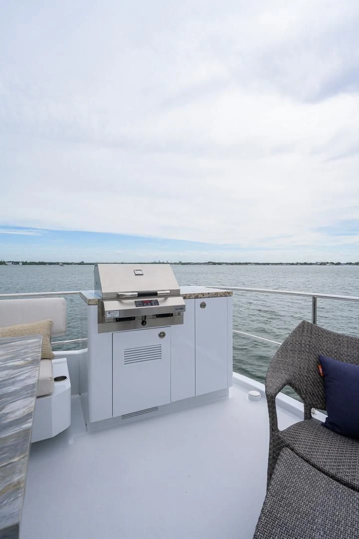 a white machine on a boat aboard MY 3 GALS Yacht for Sale