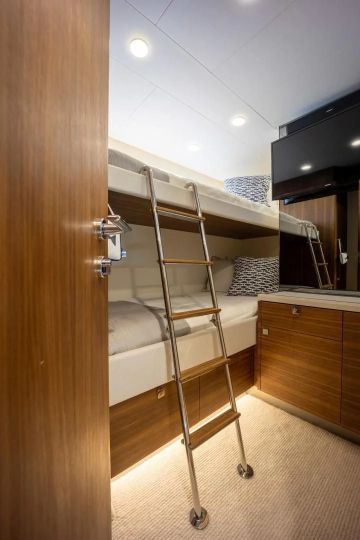 a bunk bed in a room aboard MY 3 GALS Yacht for Sale