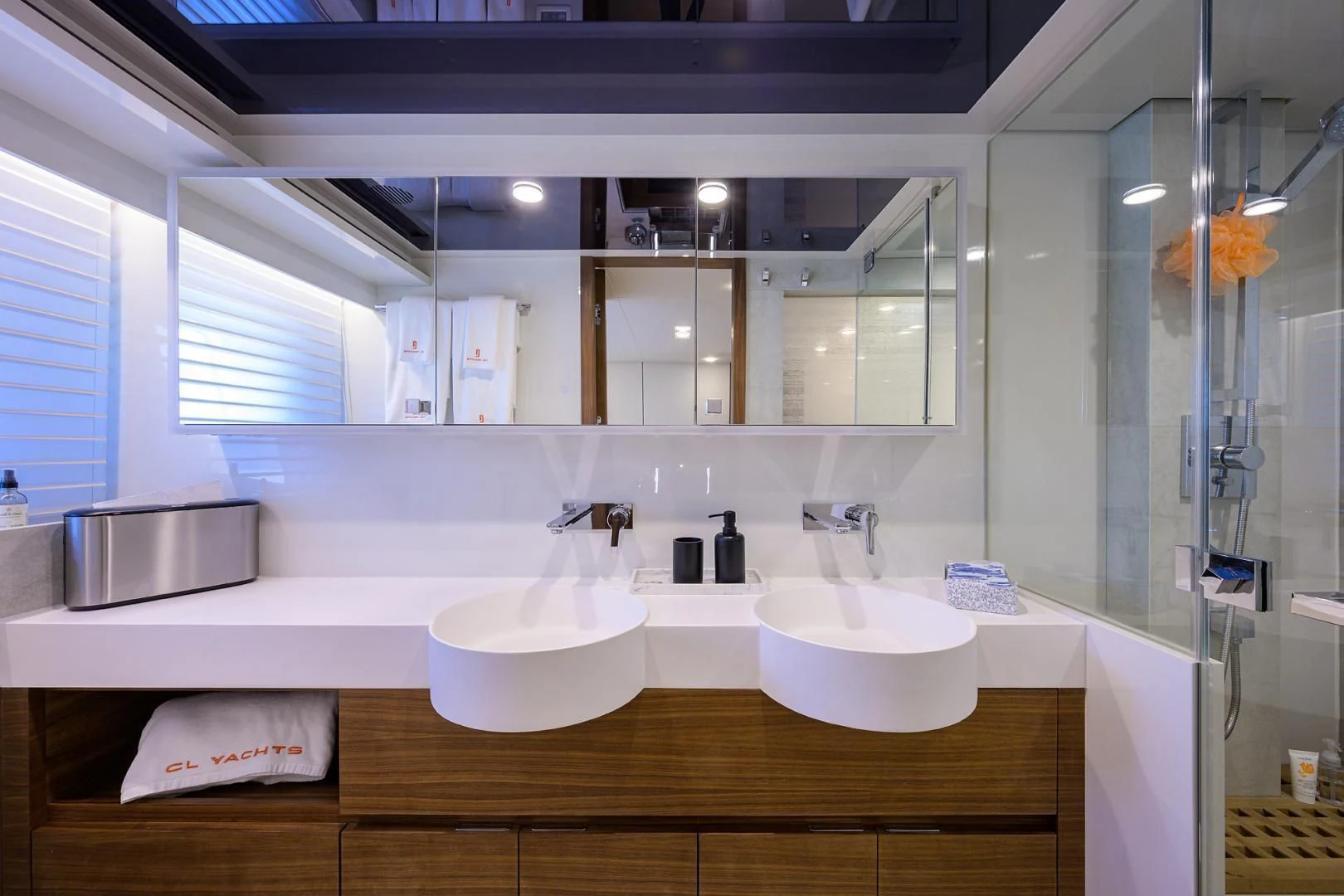 a bathroom with a large mirror aboard MY 3 GALS Yacht for Sale