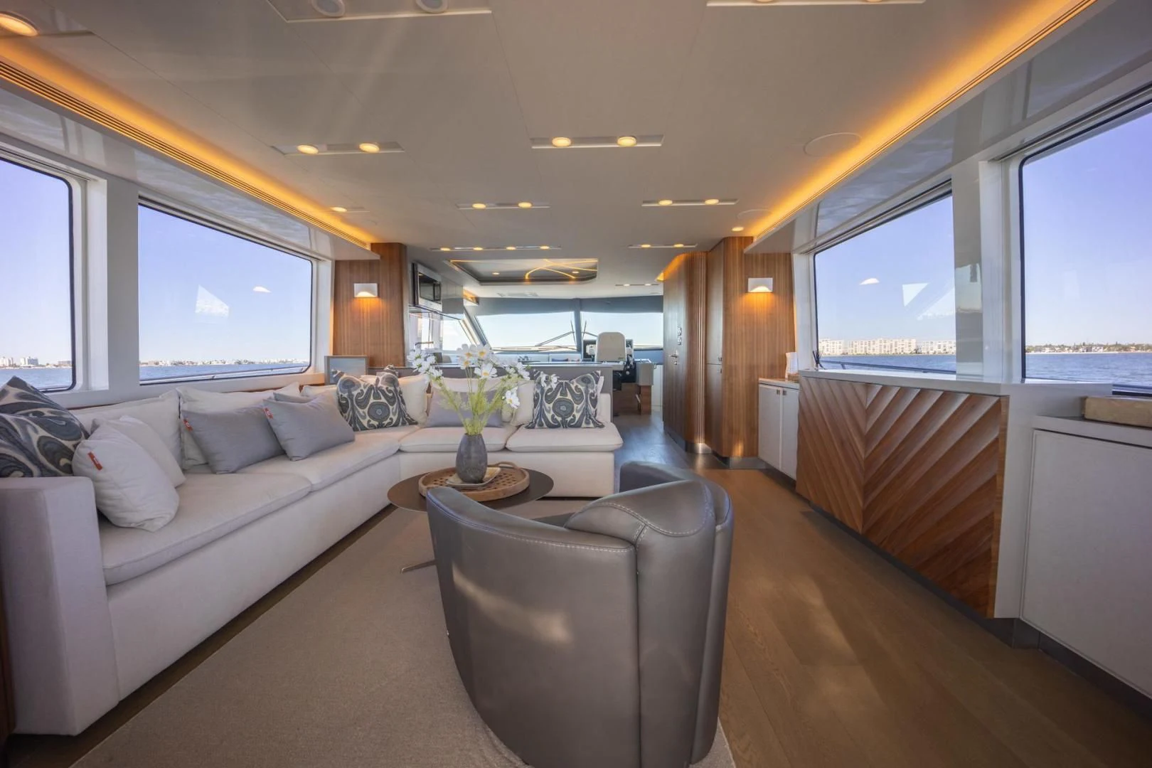 a living room with a large window aboard MY 3 GALS Yacht for Sale