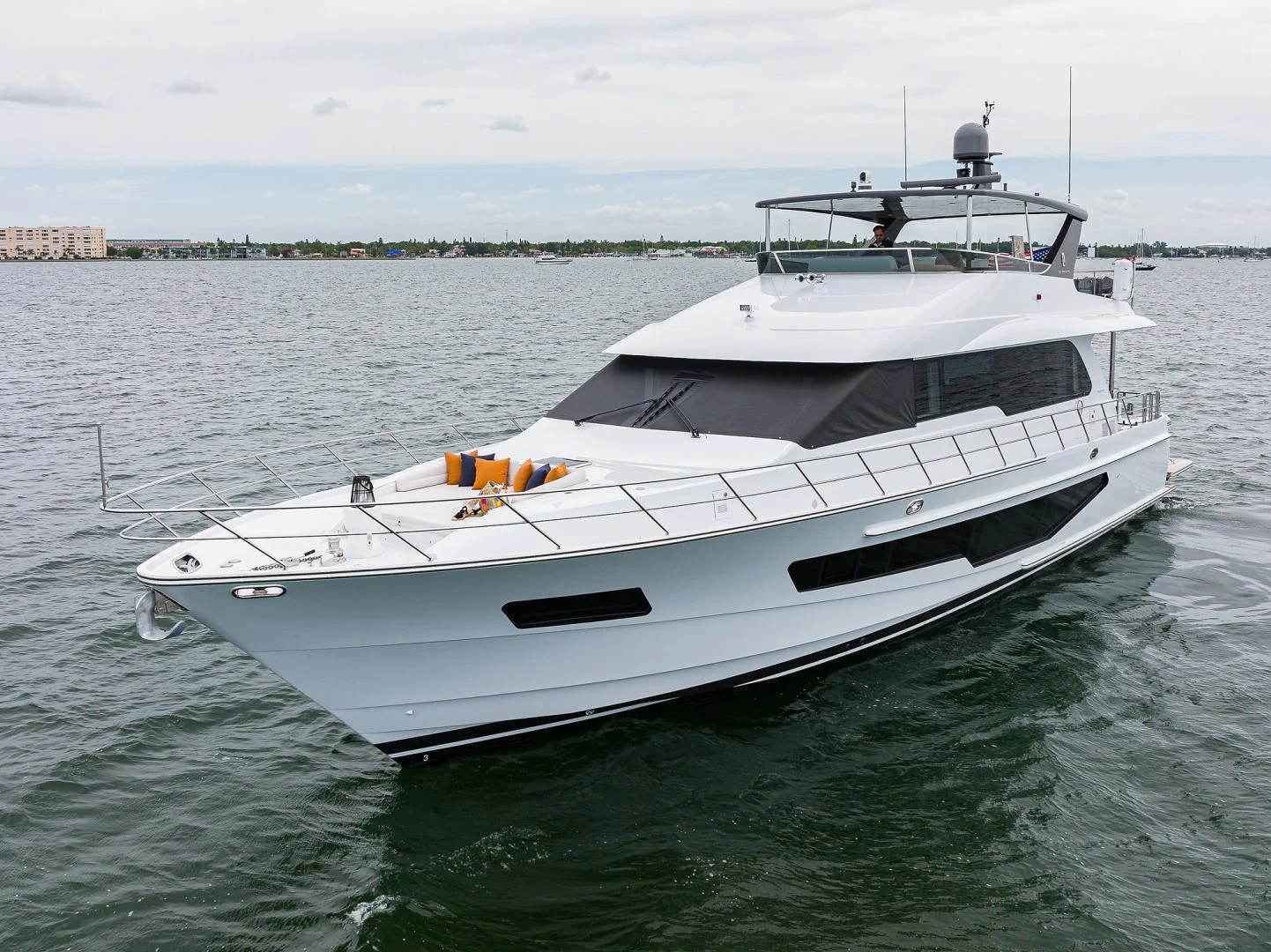 a white yacht in the water aboard MY 3 GALS Yacht for Sale