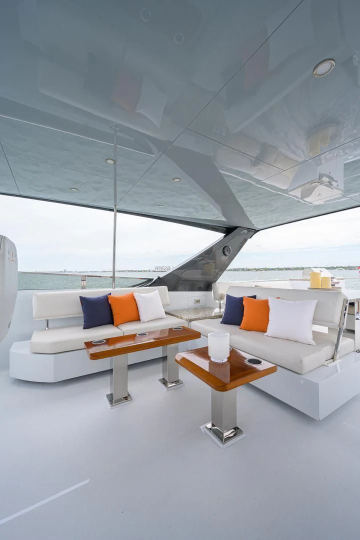 a room with a couch and a table aboard MY 3 GALS Yacht for Sale