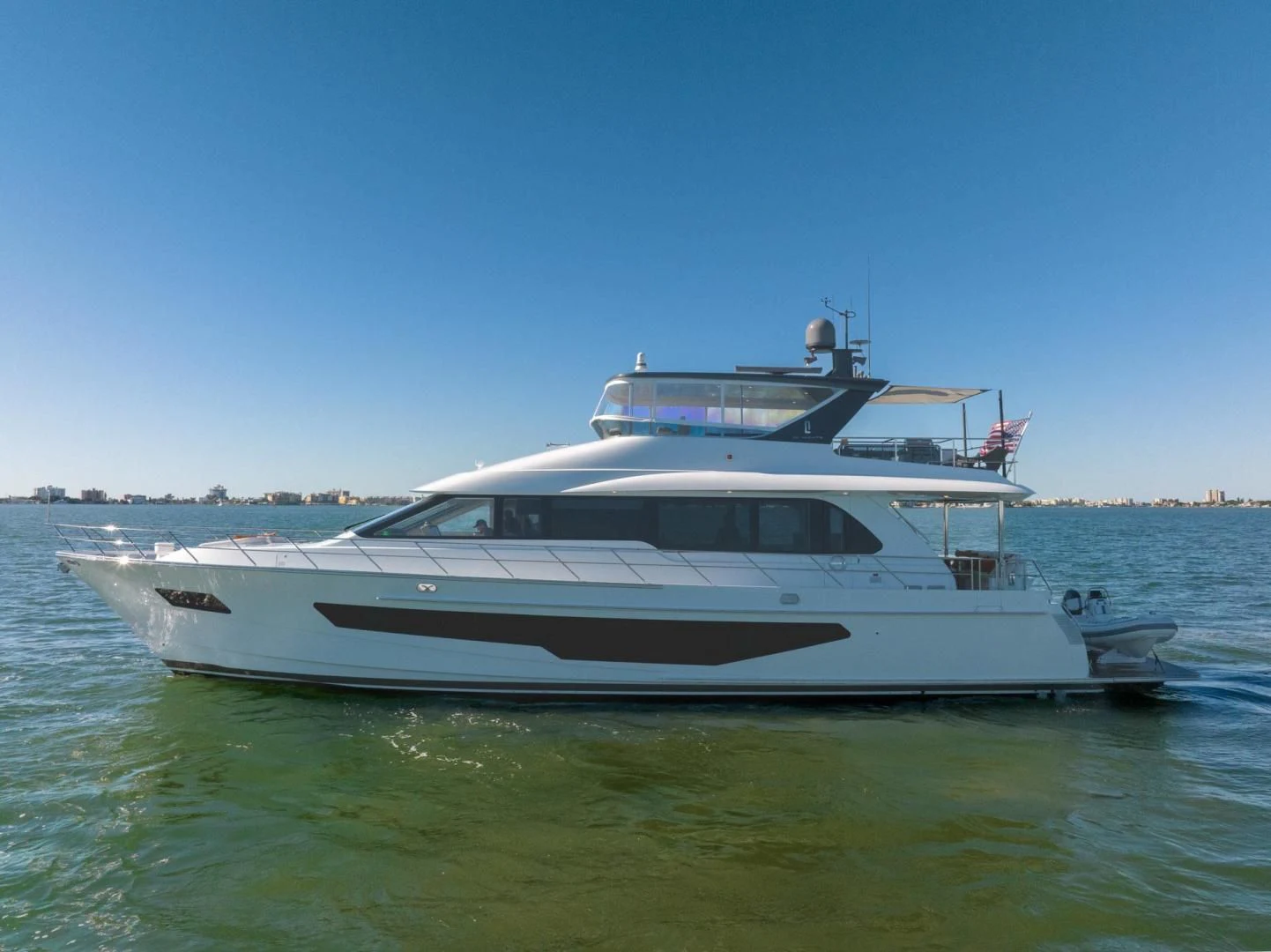 a boat on the water aboard MY 3 GALS Yacht for Sale