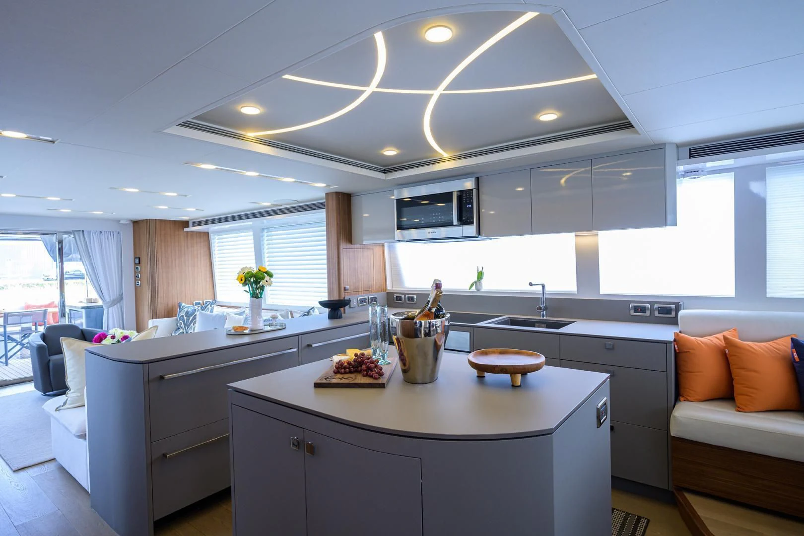 a kitchen with a large island aboard MY 3 GALS Yacht for Sale