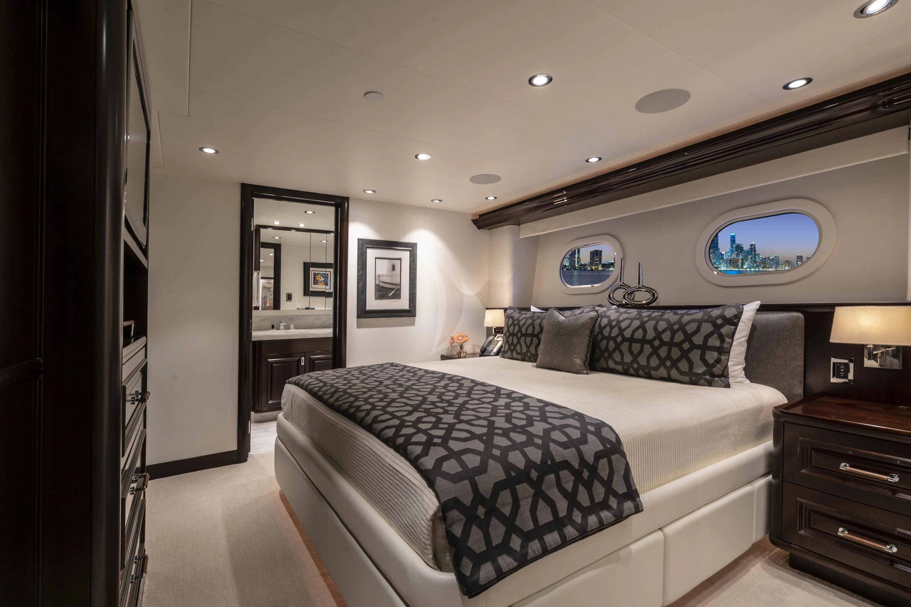 a bedroom with a large bed aboard DRILLER Yacht for Sale