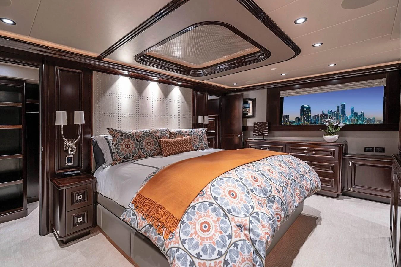 a large bedroom with a large bed aboard DRILLER Yacht for Sale