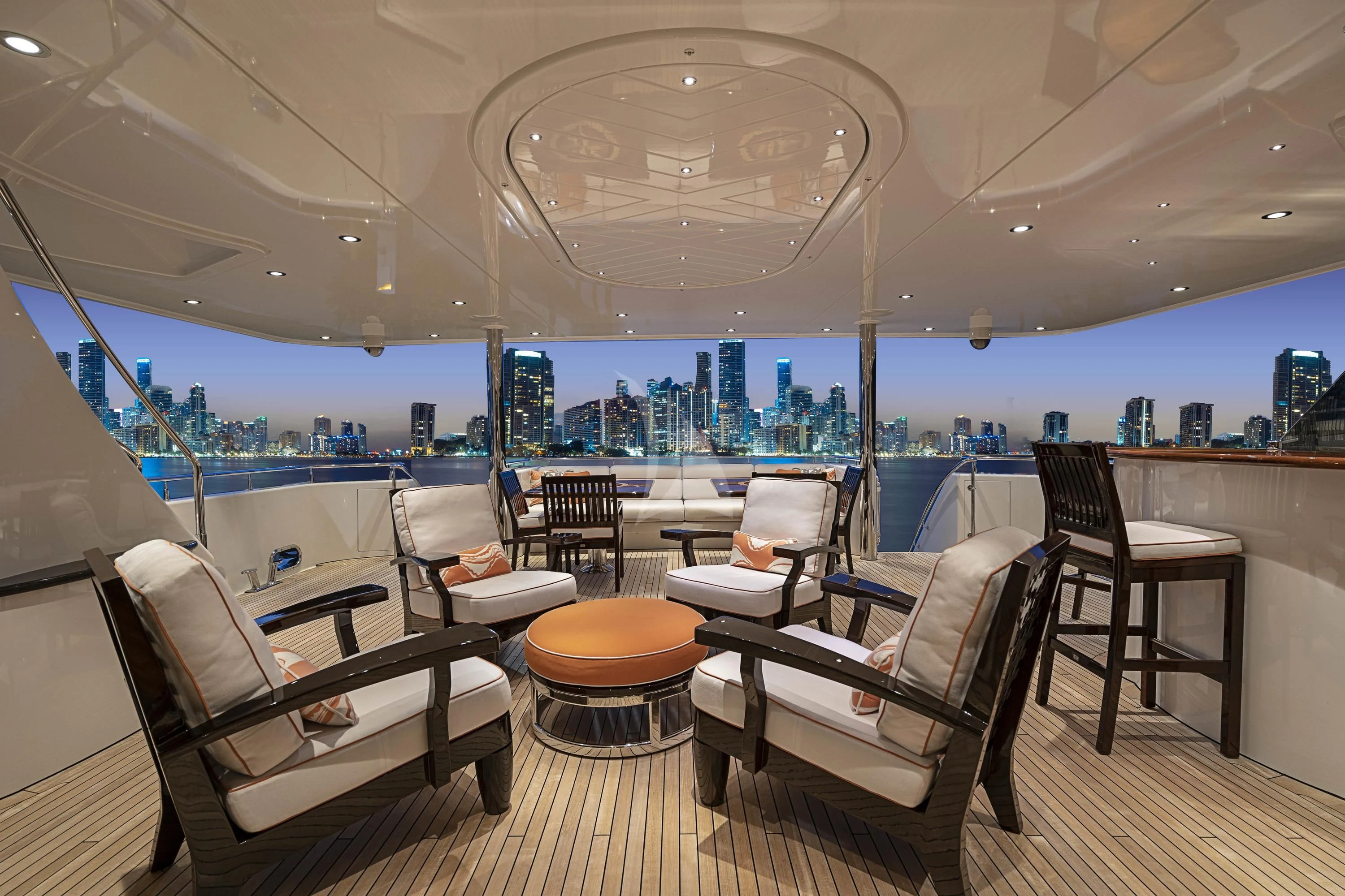 a large room with chairs and a table aboard DRILLER Yacht for Sale