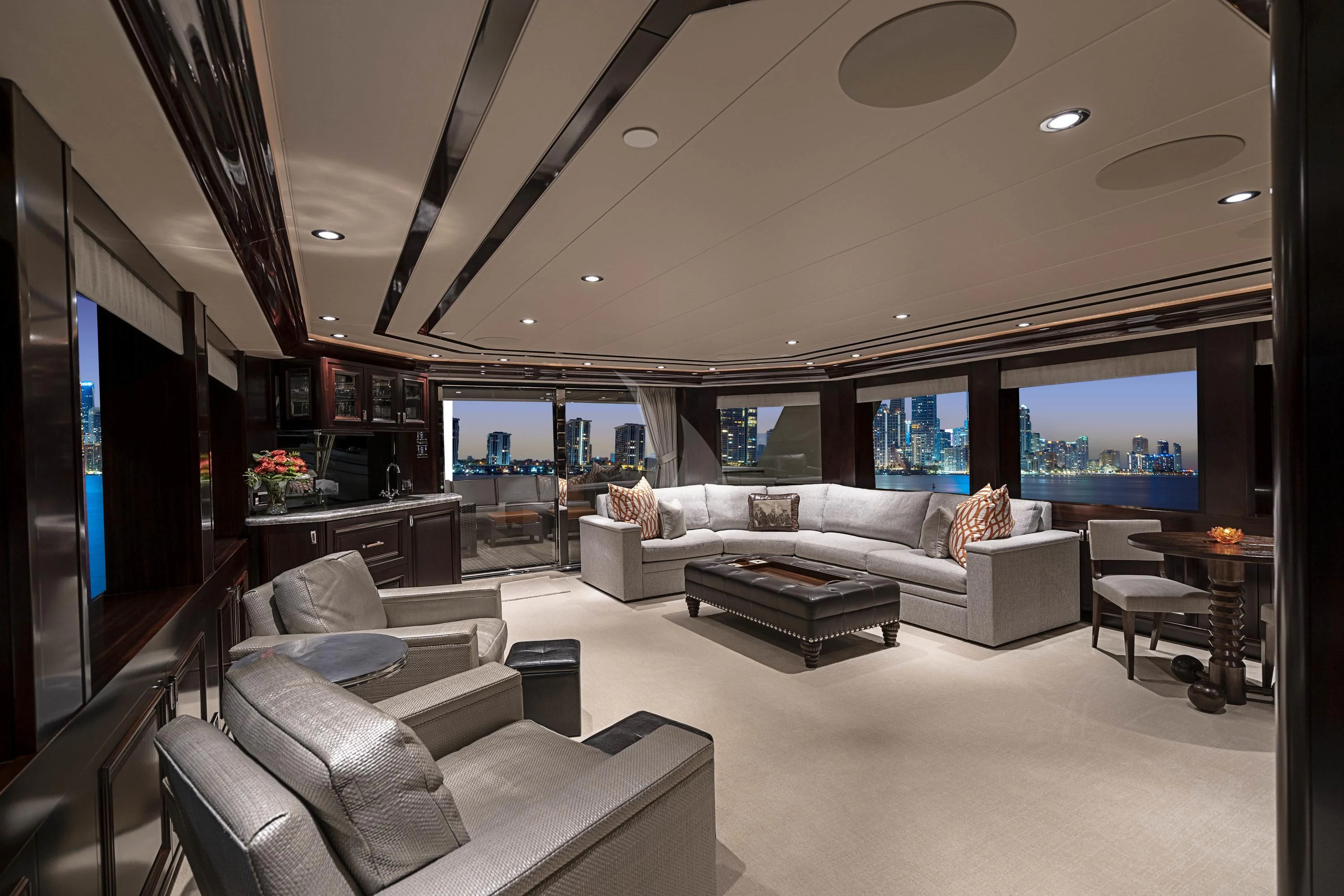 a living room with a large window aboard DRILLER Yacht for Sale