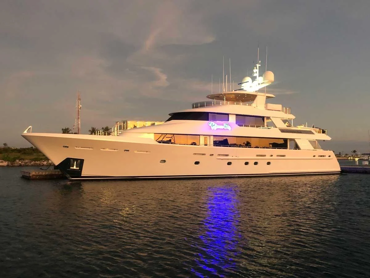 a white yacht on the water aboard DRILLER Yacht for Sale