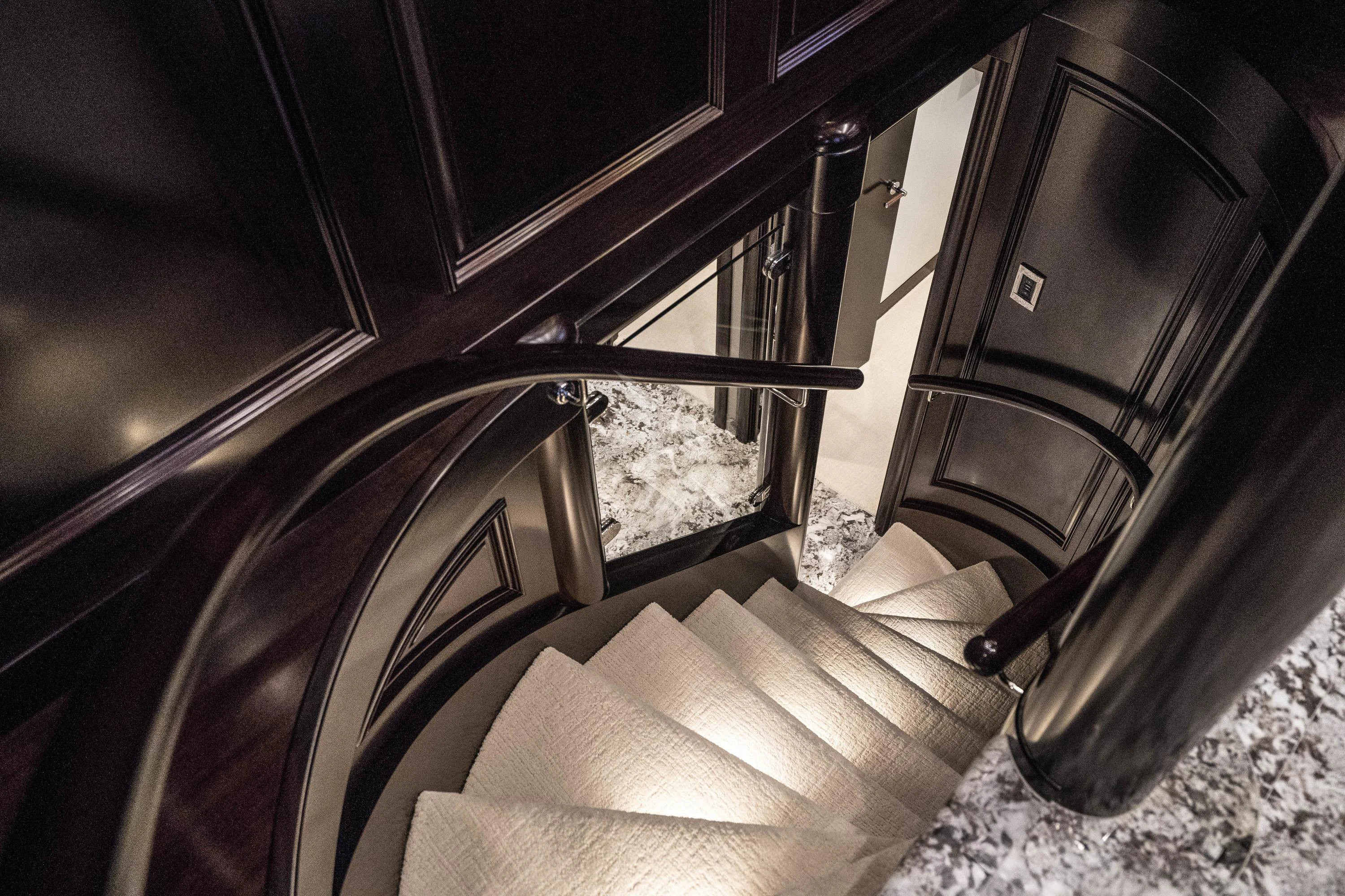 a staircase in a house aboard DRILLER Yacht for Sale