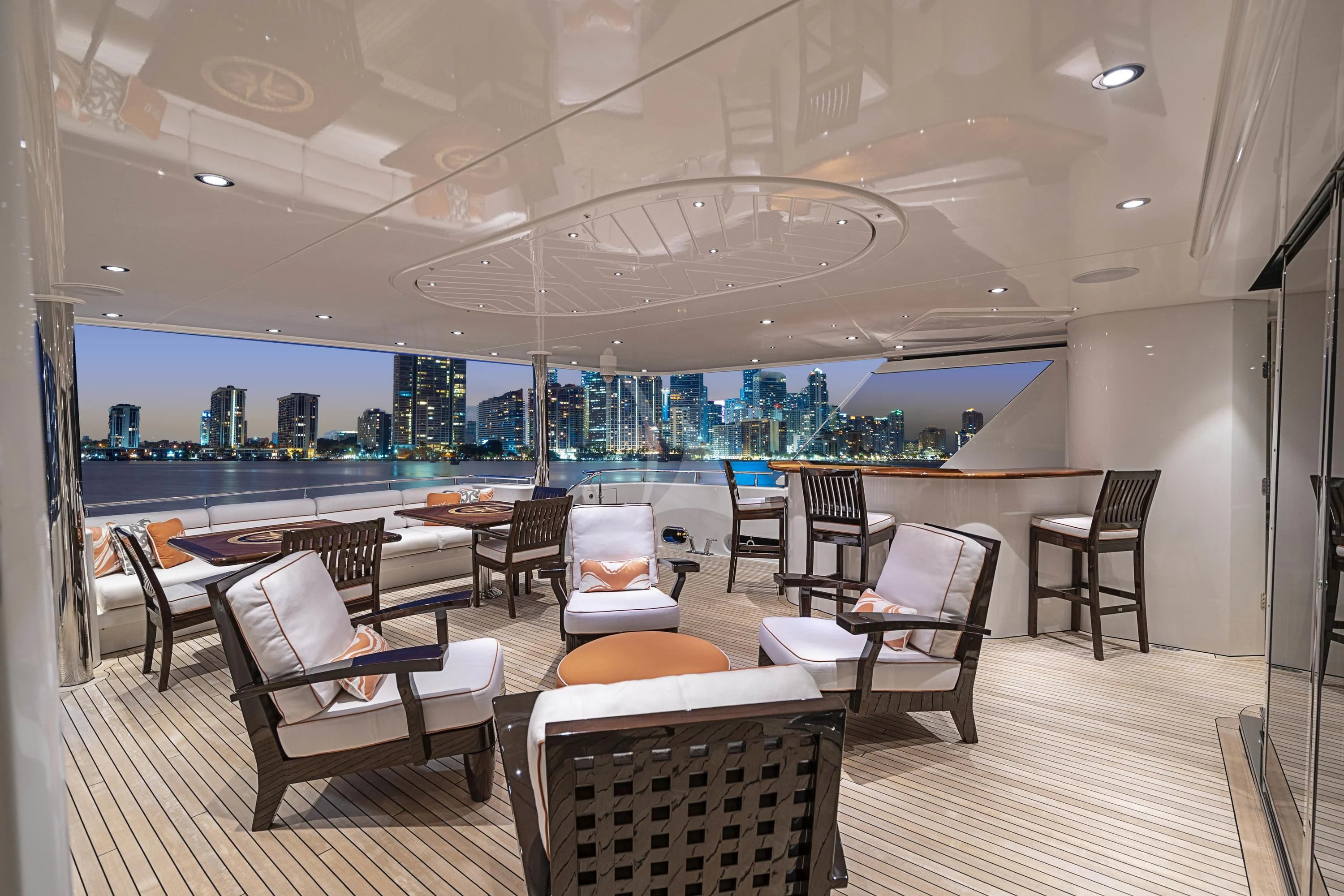 a large room with a large table and chairs aboard DRILLER Yacht for Sale