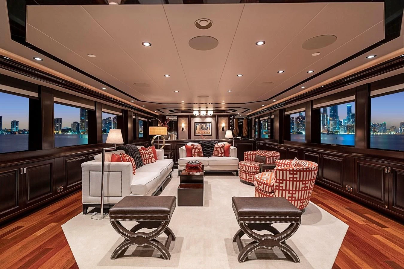 a living room with a large screen aboard DRILLER Yacht for Sale
