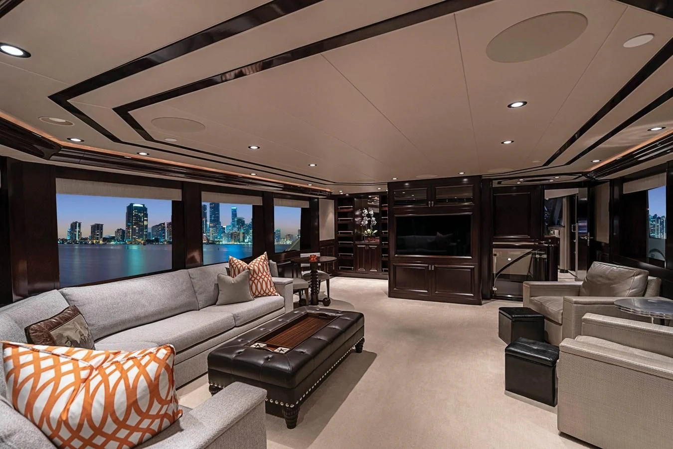 a living room with a large window aboard DRILLER Yacht for Sale