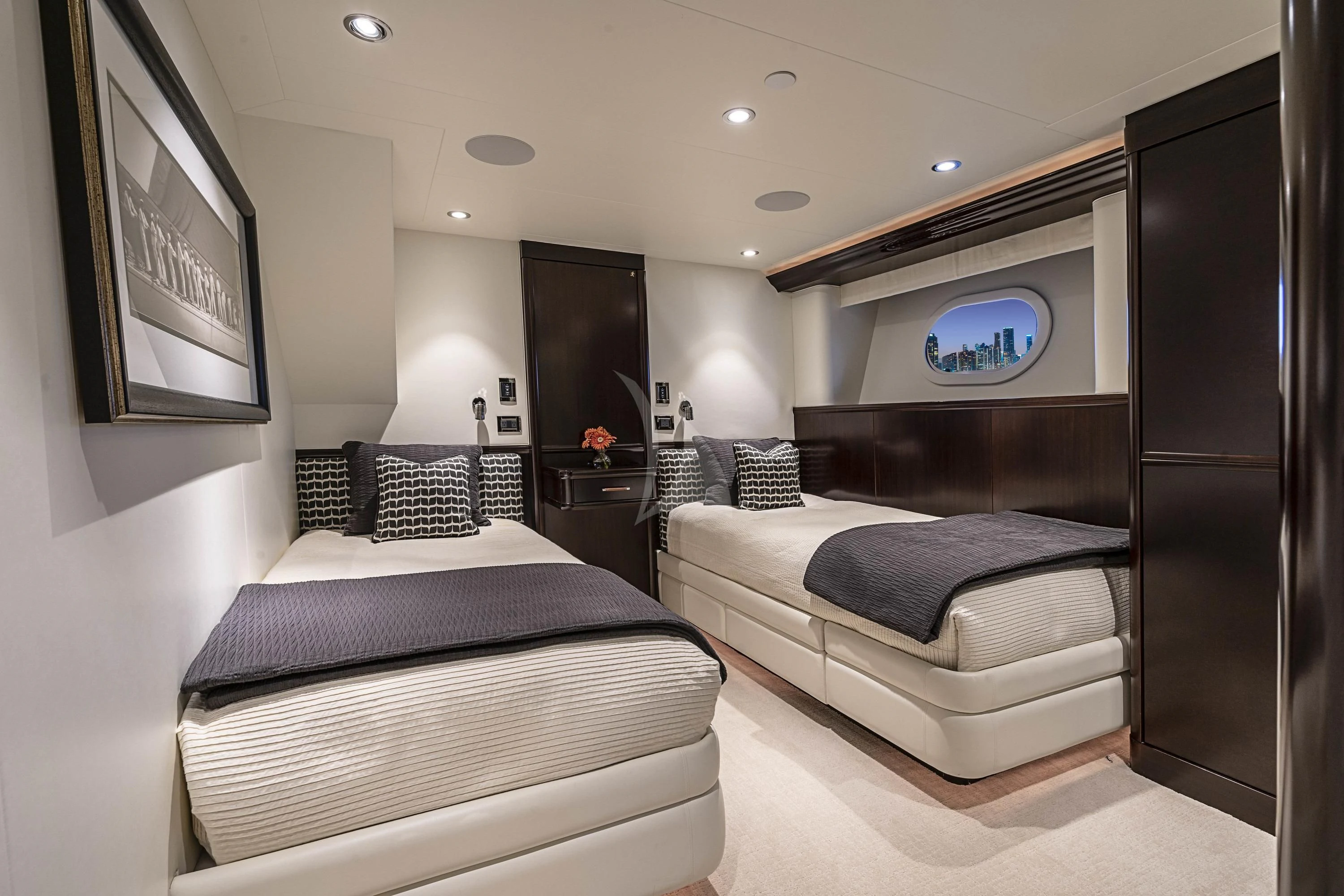 a room with two beds aboard DRILLER Yacht for Sale