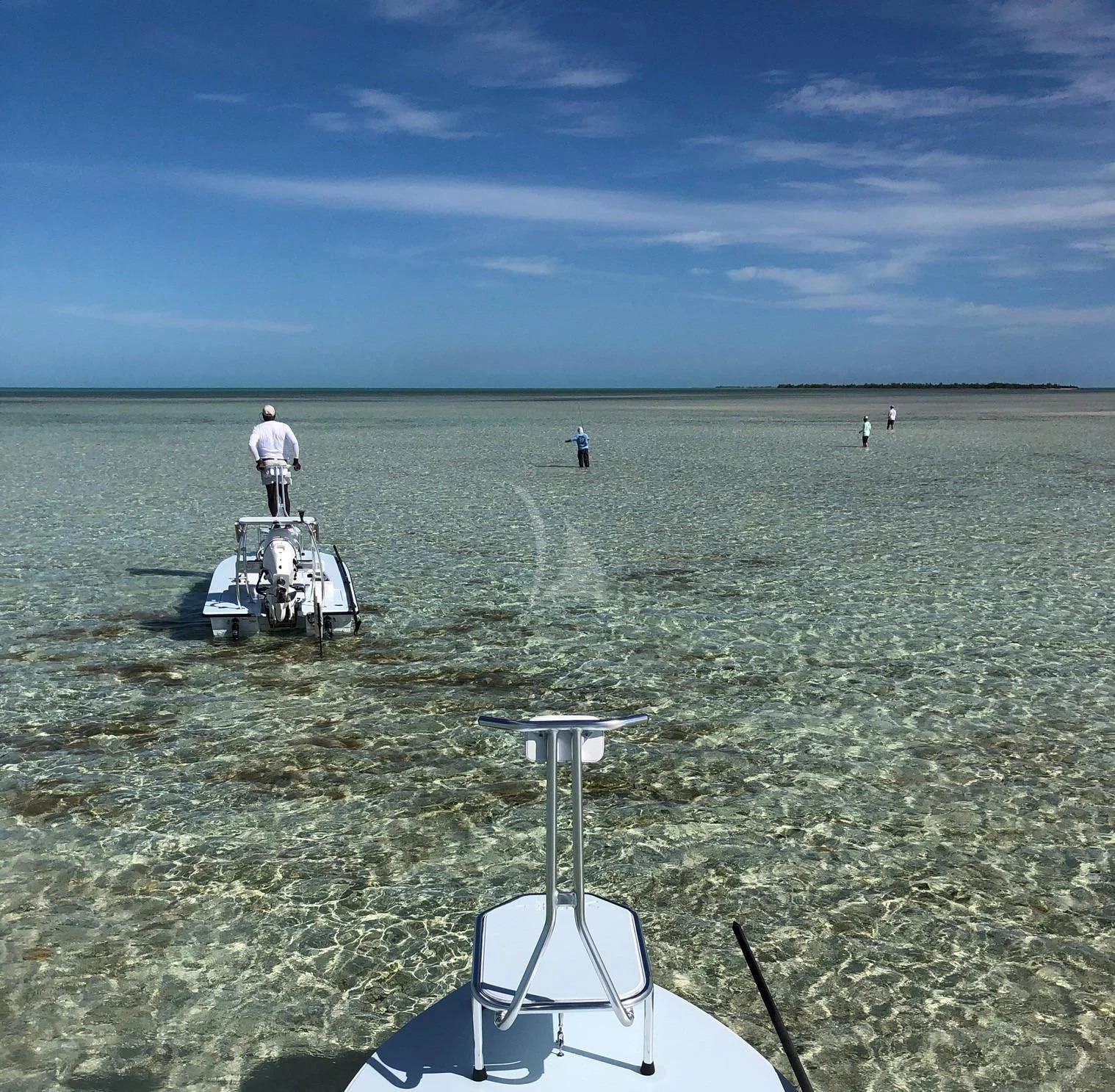 a person standing on a boat in the water aboard DRILLER Yacht for Sale