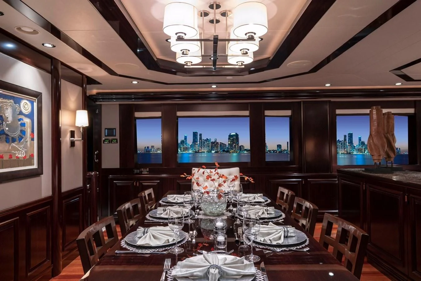 a large dining room with a large table and chairs aboard DRILLER Yacht for Sale