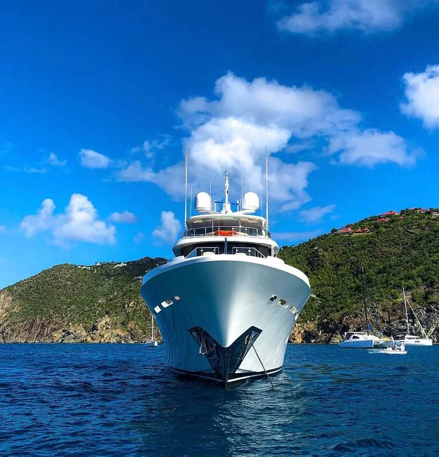 a white boat in the water aboard DRILLER Yacht for Sale