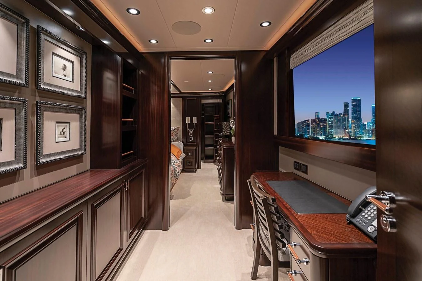 a hallway with a large window aboard DRILLER Yacht for Sale