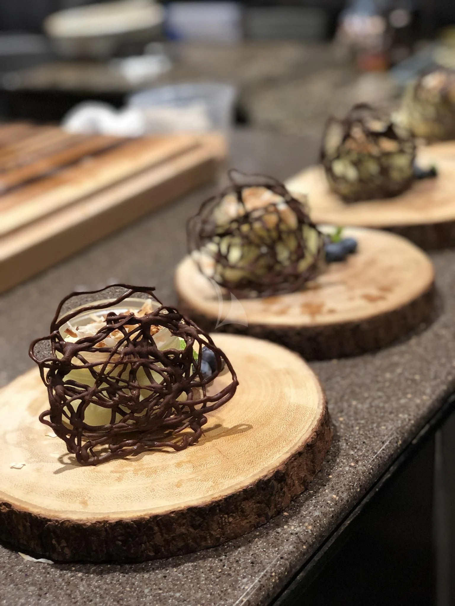 a group of round objects on a table aboard DRILLER Yacht for Sale