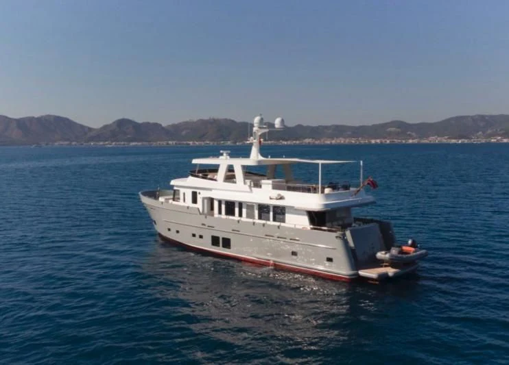 a boat in the water aboard MURAL YACHTS 85 TRAWLER Yacht for Sale