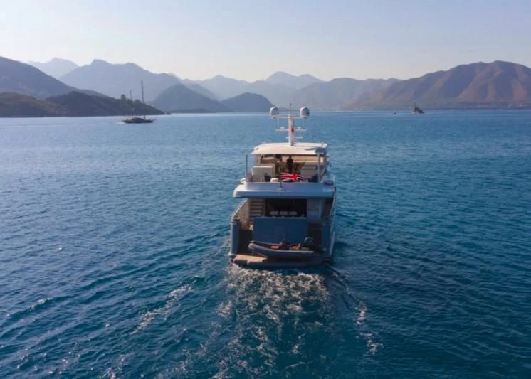 a boat in the water aboard MURAL YACHTS 85 TRAWLER Yacht for Sale
