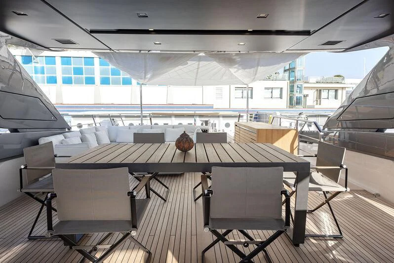 an empty office with a large window aboard AMWAJ Yacht for Sale