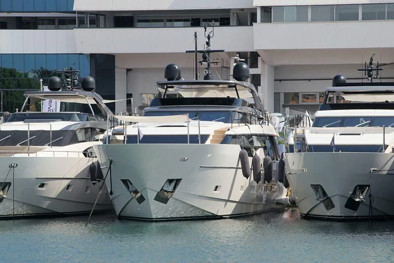 several boats are parked in the water aboard AMWAJ Yacht for Sale