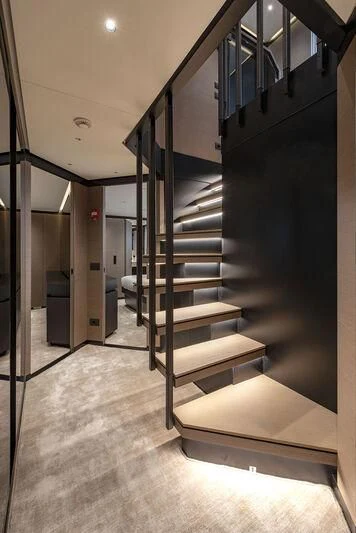 a staircase in a building aboard AMWAJ Yacht for Sale
