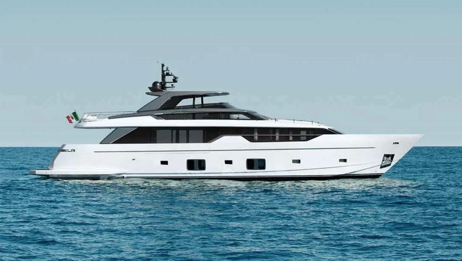 a large white boat in the water aboard AMWAJ Yacht for Sale