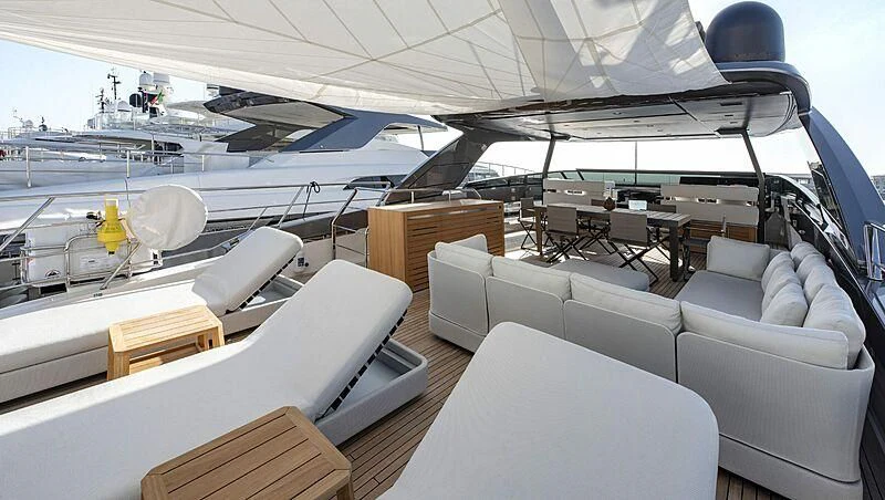 a boat with a desk and chairs aboard AMWAJ Yacht for Sale
