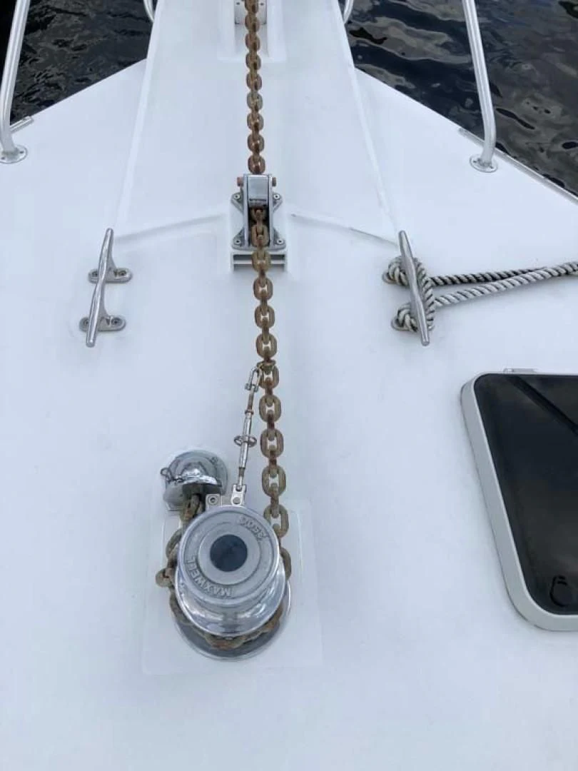 a group of keys on a white surface aboard PRIME TIME Yacht for Sale