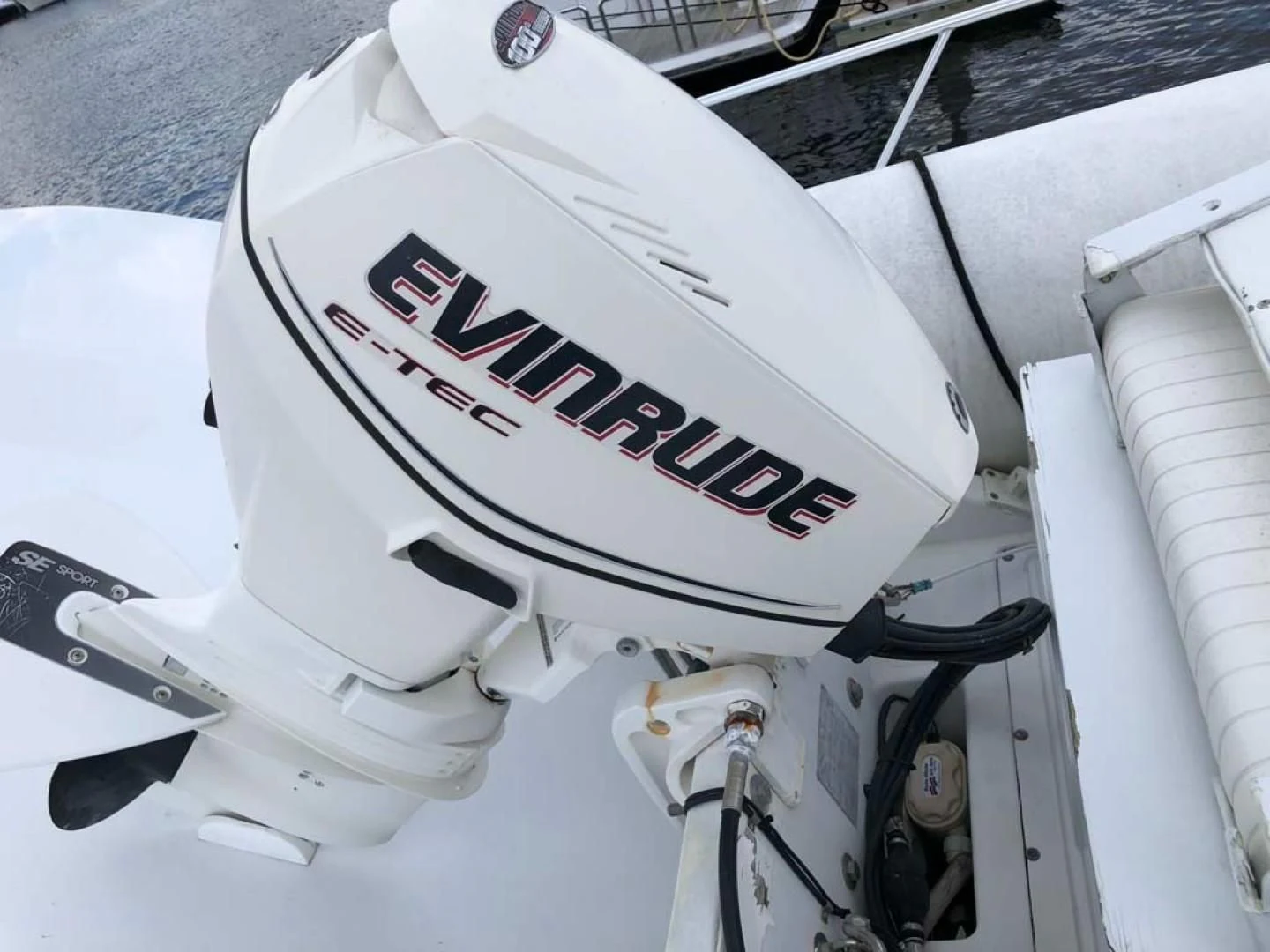 a white car with a license plate aboard PRIME TIME Yacht for Sale
