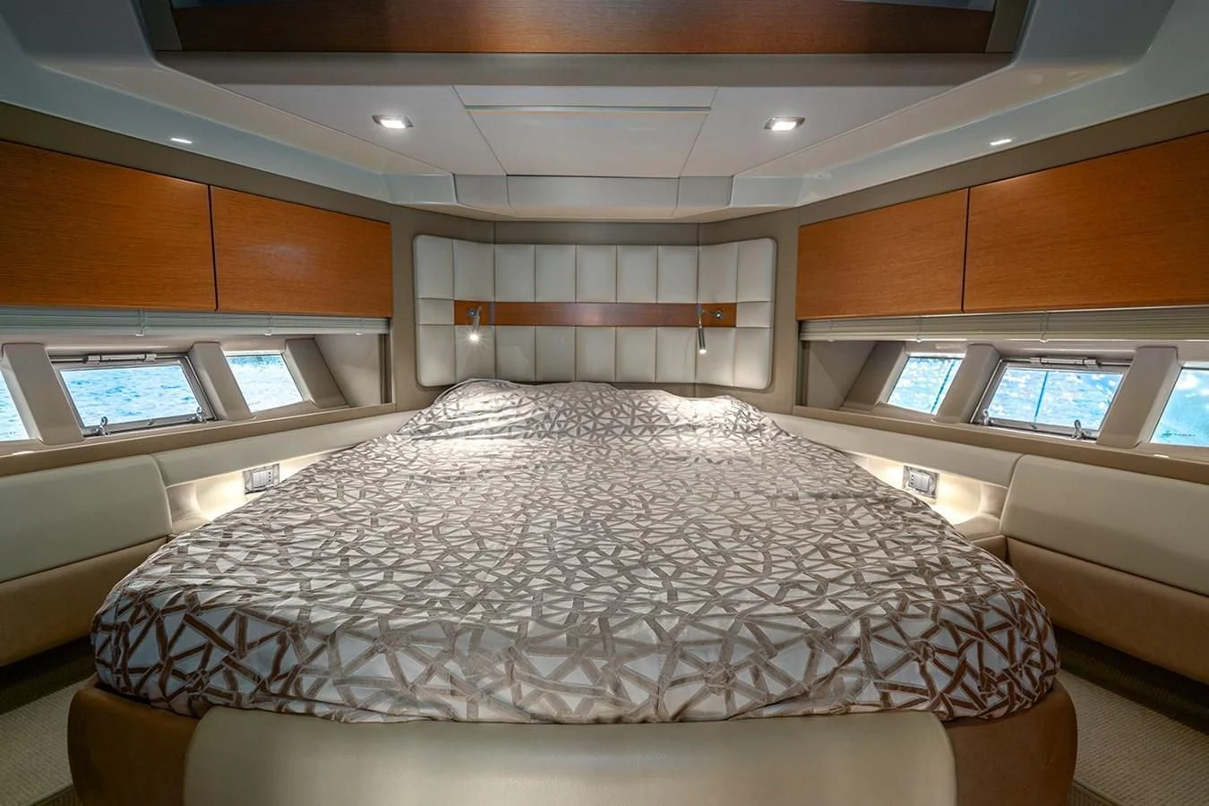 a large bed in a room aboard ELENA I Yacht for Sale