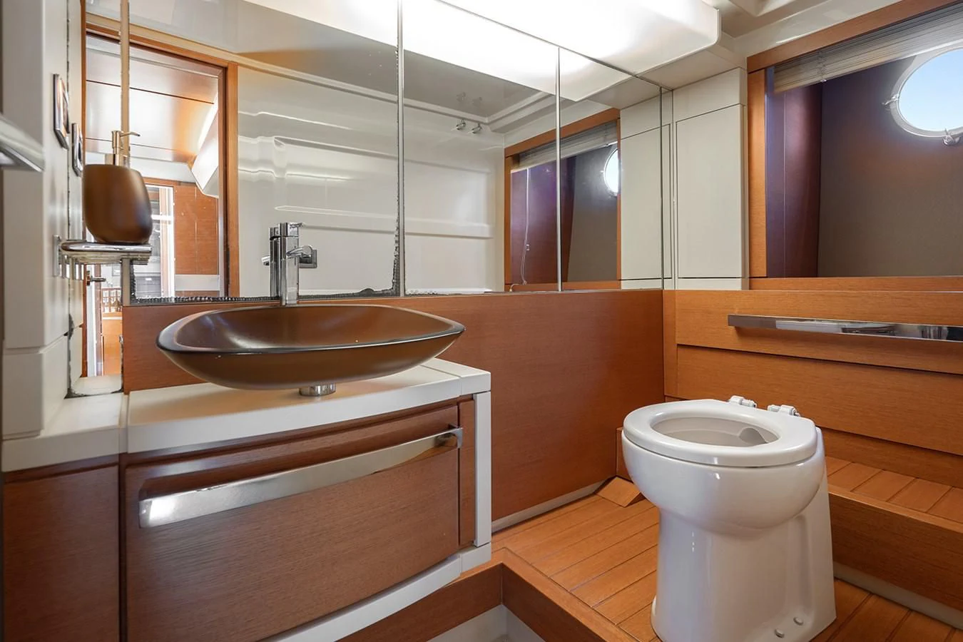 a bathroom with a sink and toilet aboard ELENA I Yacht for Sale
