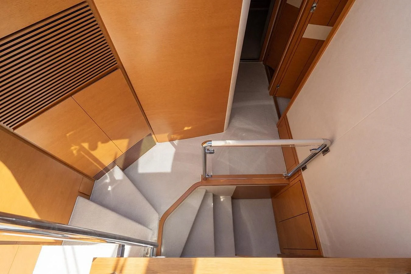 a staircase with a metal railing aboard ELENA I Yacht for Sale
